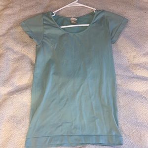 Tight fitted, blue shirt sleeve top